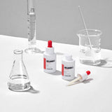 ProtoClinical k-beauty MEDIPEEL Melanon X Ampoule 30ml pale beige ampoule packaging shapes on a light gray background