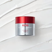 ProtoClinical k-beauty soft mauve beauty product visual centered on a light background with pale aqua corners.