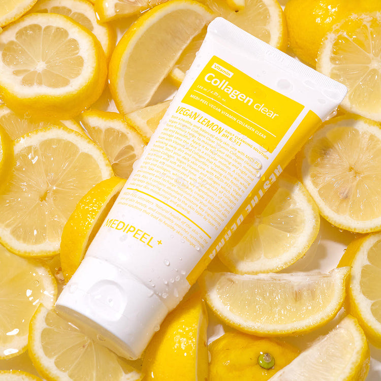 ProtoClinical k-beauty MEDIPEEL Vegan Vitamin Collagen Clear 300ml single upright pale bottle on a warm gold background.
