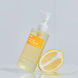 ProtoClinical k-beauty MEDIPEEL Vitamin Deep-Tox Cleansing Oil 200ml single upright pale yellow cleansing oil bottle on a light blue background.