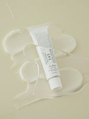 ProtoClinical k-beauty pale beige beauty graphic with soft yellow shading in the upper right on a light background.
