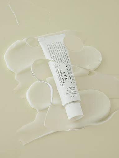 ProtoClinical k-beauty pale beige beauty graphic with soft yellow shading in the upper right on a light background.