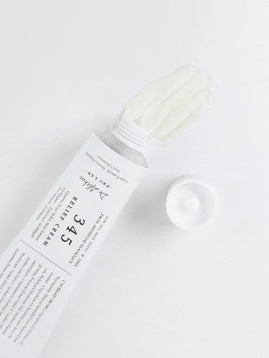 ProtoClinical k-beauty light gray beauty graphic on a soft off-white background.