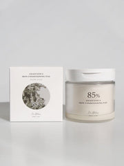 ProtoClinical k-beauty soft gray beauty graphic with a blurred vertical shadow and warm beige tones on a light background.