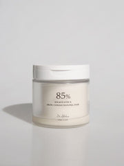 ProtoClinical k-beauty soft gray beauty graphic with a blurred vertical shadow and warm beige tones on a light background.