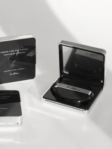 ProtoClinical k-beauty grayscale beauty graphic with a dark rounded form and soft pale highlights on a light background.