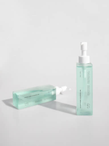 ProtoClinical k-beauty pale blue beauty graphic with a centered horizontal gray band on a light background.
