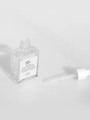 ProtoClinical k-beauty Dr.Althea Natural Radiance Essence 30ml pale blue beauty graphic with a centered vertical soft-edged band on a light background