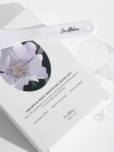 ProtoClinical k-beauty product packaging on a clean white background in yellow and blue tones.