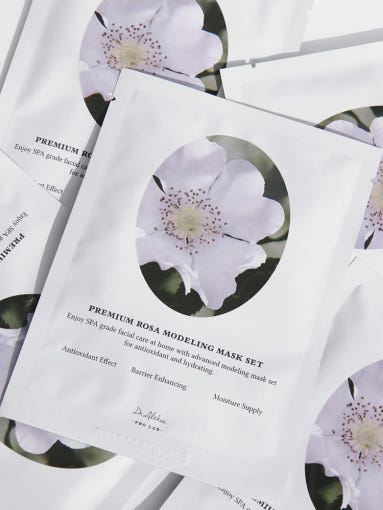 ProtoClinical k-beauty product packaging on a clean white background in mixed pastel tones.