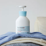 ProtoClinical k-beauty ILLIYOON Ceramide Ato Lotion 580ml single centered pale blue lotion bottle with a dark blue lower section on a white background