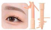ProtoClinical k-beauty colorgram All In One Aegyo-Sal Maker 0.35g three soft taupe, peach-beige, and ivory swatches side by side on a pale pink background