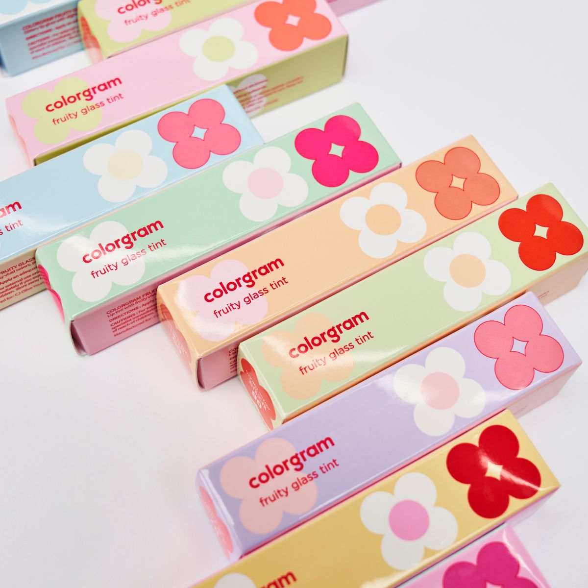 ProtoClinical k-beauty colorgram Fruity Glass Tint 2.8g single boxed lip tint package in a square packshot layout