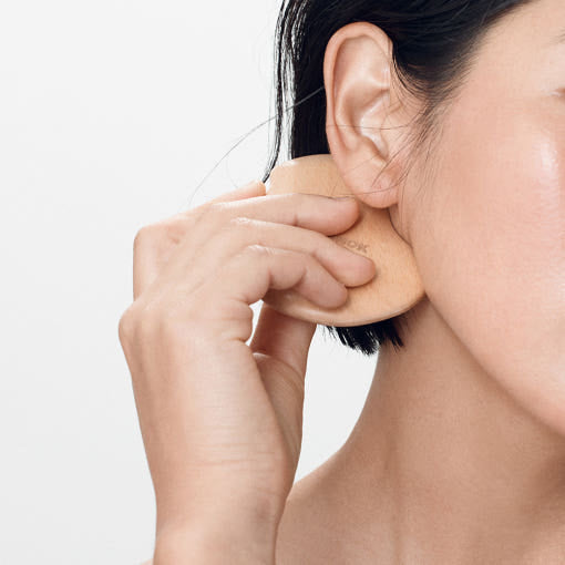 ProtoClinical k-beauty tall blue beauty product centered on a light background.