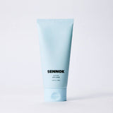 ProtoClinical k-beauty pale blue beauty bottle silhouette on a soft light background.