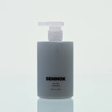 SENNOK Body Wash After Bath 300ml by ProtoClinical shown as a dark body wash bottle silhouette on a soft white background for a k-beauty body care product.