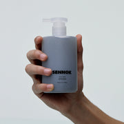 ProtoClinical k-beauty SENNOK Body Wash After Bath 300ml body wash bottle silhouette on a soft light background.