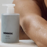 ProtoClinical k-beauty SENNOK Body Wash After Bath 300ml body wash bottle silhouette on a soft light background.