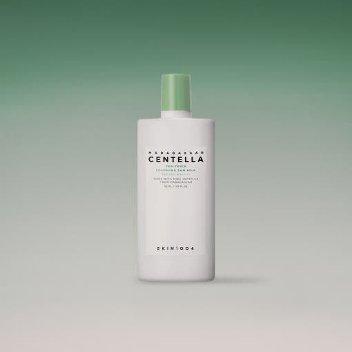 ProtoClinical k-beauty SKIN1004: Madagascar Centella Tea-trica Soothing Sun Milk SPF 50+ Pa (50ml) single pink package silhouette on a white background with deep green upper corners.