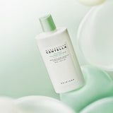 ProtoClinical k-beauty SKIN1004: Madagascar Centella Tea-trica Soothing Sun Milk SPF 50+ Pa (50ml) single pale beige package silhouette with a muted brown center on a white background.