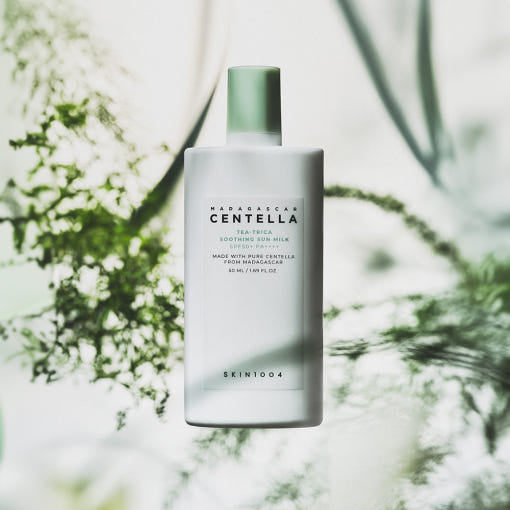 ProtoClinical k-beauty SKIN1004: Madagascar Centella Tea-trica Soothing Sun Milk SPF 50+ Pa (50ml) single warm beige package silhouette with a soft cream lower accent on a light background.