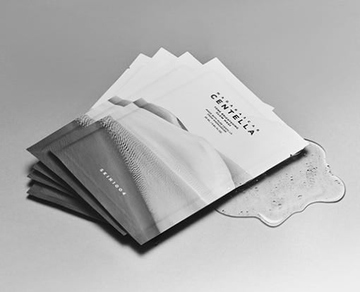 SKIN1004: Madagascar Centella Tone Brightening Glow Mask 25ml* (5Units) by ProtoClinical shown in front-facing sheet mask packaging on a clean white background, highlighting the glow mask artwork for a k-beauty skincare routine.