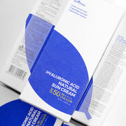ProtoClinical k-beauty Isntree Hyaluronic Acid Natural Suncream SPF50+PA++++ 50ml single upright suncream tube centered in a square studio layout on a light background