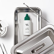 ProtoClinical k-beauty Dr.Ceuracle AC Cure Solution Green Two 50ml single upright bottle centered on a dark green background
