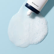 ProtoClinical k-beauty abstract light blue beauty graphic with a soft dark gray shape near the upper right.