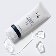 ProtoClinical k-beauty abstract soft gray beauty graphic with a muted dark center spot and pale vertical blur.