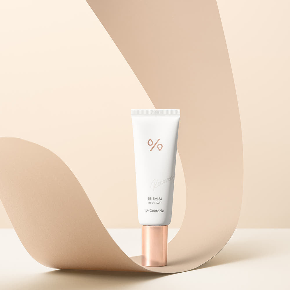 ProtoClinical k-beauty warm beige beauty graphic with a soft diagonal cream band and muted gray lower shading.