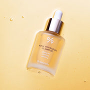 ProtoClinical k-beauty Dr.Ceuracle Royal Vita Propolis 33 Ampoule 30ml single centered amber ampoule bottle on a warm yellow background with a pale cream upper band