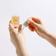 ProtoClinical k-beauty Dr.Ceuracle Royal Vita Propolis 33 Ampoule 30ml two amber ampoule shapes side by side on a white background with pale blue side shading