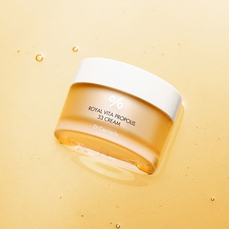 ProtoClinical k-beauty warm cream beauty graphic with a soft gray vertical center and a pale yellow lower band.