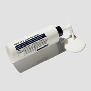 ProtoClinical k-beauty abstract pale gray beauty graphic with a soft vertical center shadow on a light background.