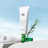 ProtoClinical k-beauty Dr.Ceuracle Tea Tree Purifine Green Up Sun SPF50 PA++++ 50ml single centered pale gray sunscreen package on a light blue and white background.