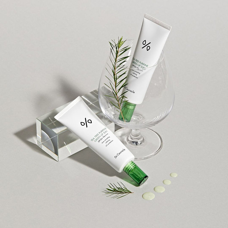 ProtoClinical k-beauty Dr.Ceuracle Tea Tree Purifine Green Up Sun SPF50 PA++++ 50ml single centered sunscreen package on a light background.