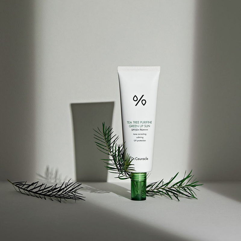 ProtoClinical k-beauty Dr.Ceuracle Tea Tree Purifine Green Up Sun SPF50 PA++++ 50ml single centered dark gray sunscreen package on a charcoal and light gray background.