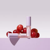 ProtoClinical k-beauty Dr.Ceuracle Vegan Active Berry Lip Oil 4.5ml three berry-toned lip oil bottles side by side on a pastel blue and pink background