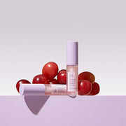 ProtoClinical k-beauty Dr.Ceuracle Vegan Active Berry Lip Oil 4.5ml three berry-toned lip oil bottles side by side on a pastel blue and pink background