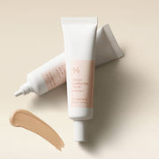 ProtoClinical k-beauty Dr.Ceuracle Vegan Kombucha Tea BB SPF30 PA++ 30m abstract beige and gray skincare graphic with two soft vertical blurred forms on a light background.