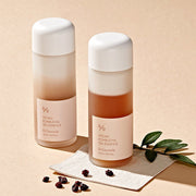 ProtoClinical k-beauty muted rose and beige beauty graphic with horizontal bands on a light background.