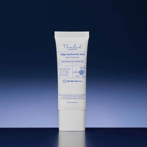 ProtoClinical k-beauty [THE LAB by BLANC DOUX] Oligo Hyaluronic Acid Sun Essence SPF50+ PA++++ 40ml single upright sun essence package centered on a dark navy background.