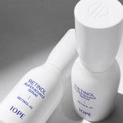 ProtoClinical k-beauty IOPE Retinol Super Bounce Serum 30ml dark gray product graphic with pale blue highlights on a light background