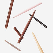 ProtoClinical k-beauty BBIA Last Auto Gel Eyeliner 0.3g with a slim gray eyeliner pencil and matching swatch strokes angled across a clean white background