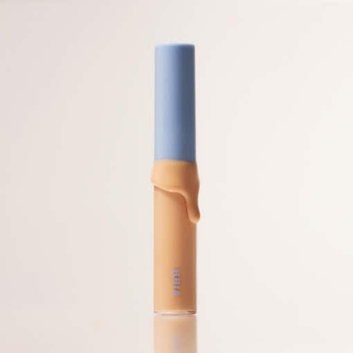 ProtoClinical k-beauty BBIA Last Eye Primer 5g single beige primer tube lying horizontally on a warm peach background