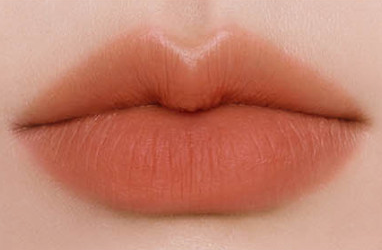 ProtoClinical k-beauty BBIA Last Powder Lipstick 3.5g orange-coral lipstick swatch centered on a pale cream background