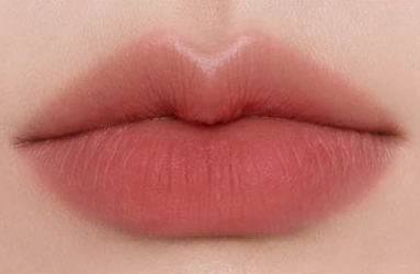 ProtoClinical k-beauty BBIA Last Powder Lipstick 3.5g coral-red lipstick swatch centered on a pale cream background