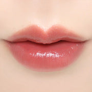 ProtoClinical k-beauty BBIA Ready To Wear Water Lipstick 3g coral-red lipstick swatch stretched horizontally on a pale peach background