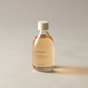 AROMATICA Mellowness Magnolia & Sandalwood Body Oil 100ml by ProtoClinical shown in a refined body oil presentation with branded packaging details for a k-beauty body care routine.
